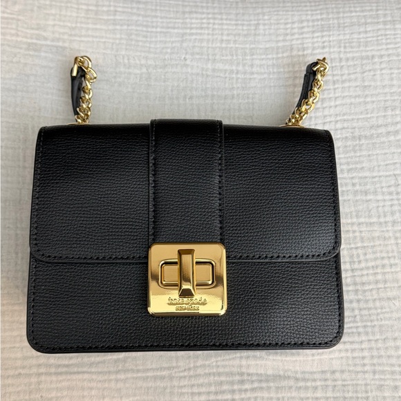 Kate Spade New York Phoebe Turnlock Mini Flap Crossbody Bag
Originally $320 - Picture 9 of 12